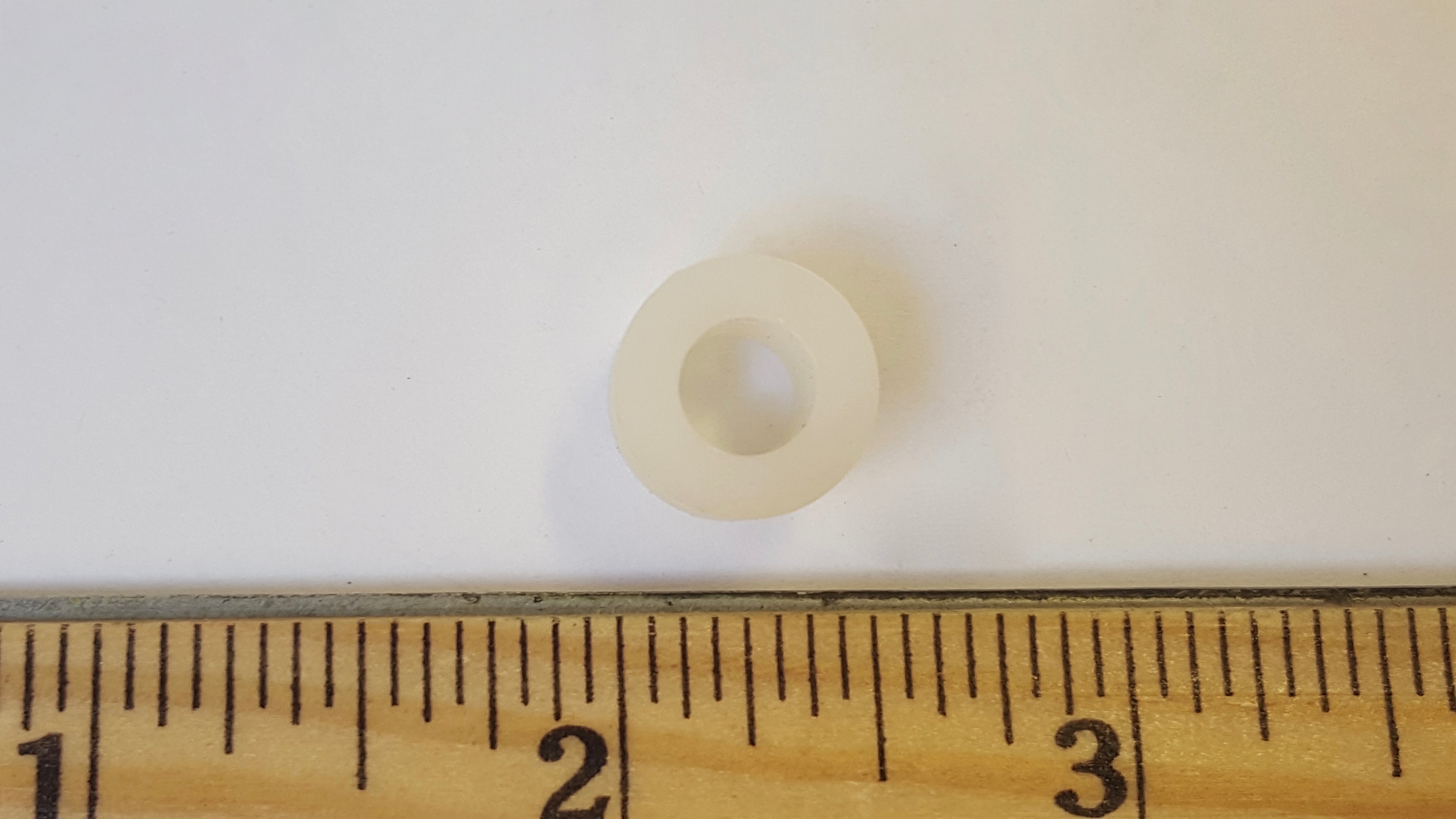 Spacer 3/8" plastic for wheel assembly 10/04